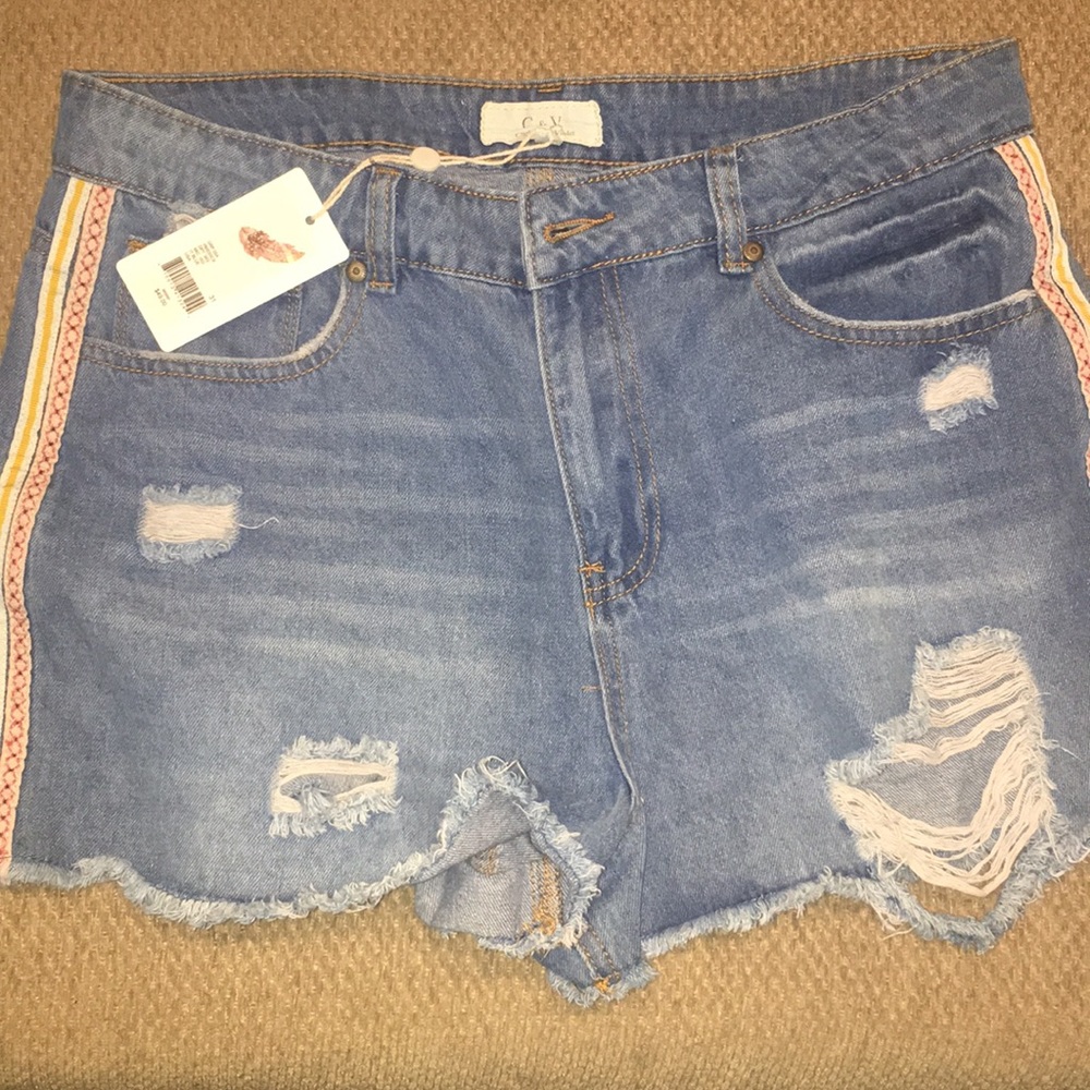 NWT Chelsea & Violet distressed denim shorts.